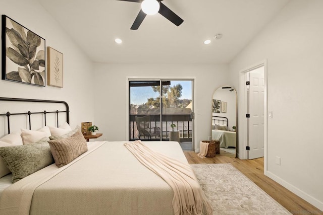 bedroom featuring ceiling fan, lofted ceiling, light hardwood / wood-style floors, and access to outside