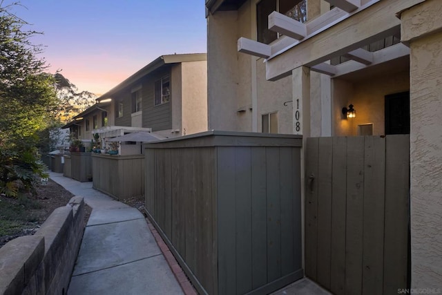 view of property exterior at dusk