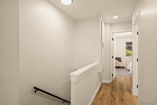 corridor featuring light hardwood / wood-style floors