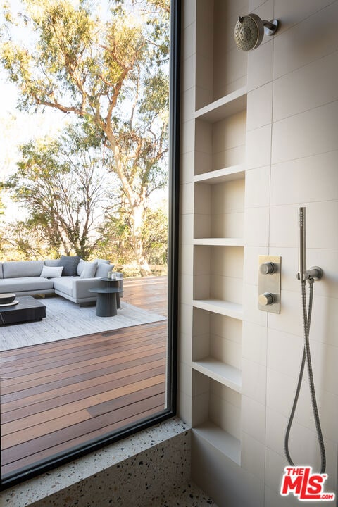 doorway to outside featuring built in features