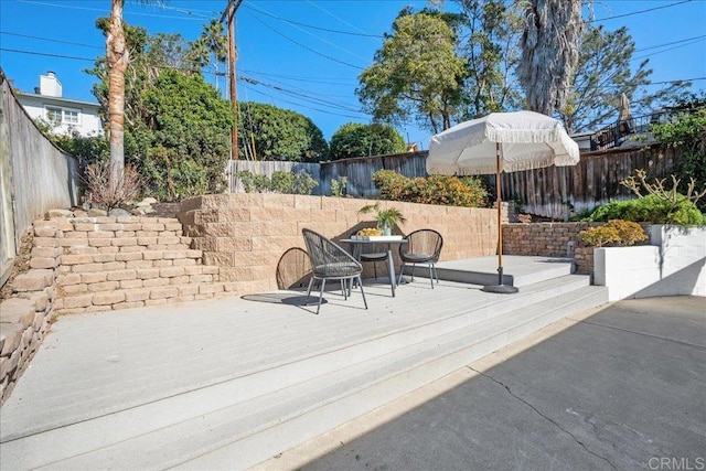 view of patio with a deck