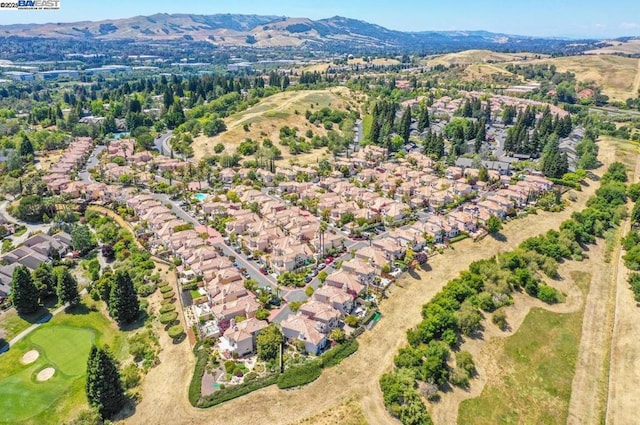 drone / aerial view featuring a mountain view