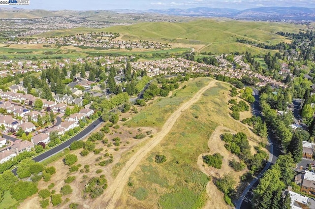 drone / aerial view featuring a mountain view