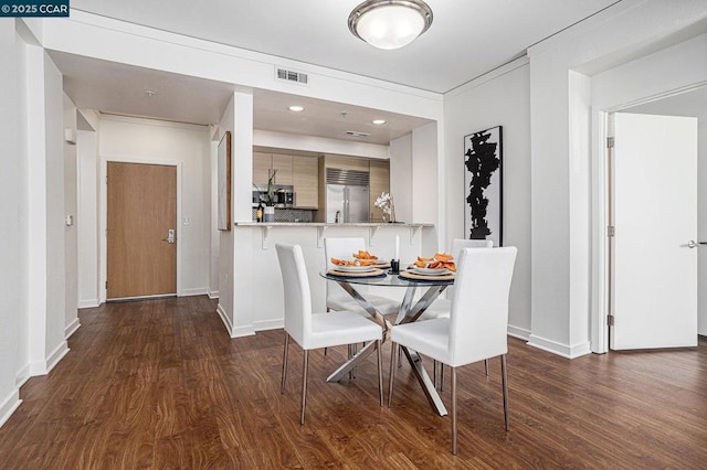 dining room featuring dark hardwood / wood-style floors