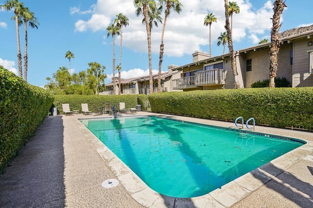 view of pool with a patio