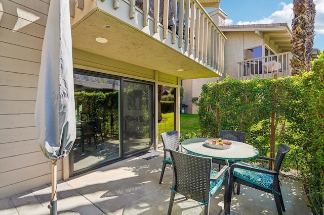 view of patio with a balcony