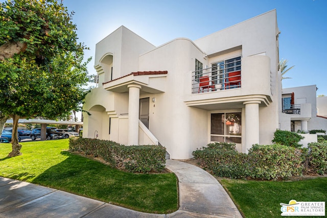 view of front of home with a front yard