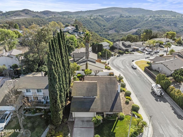 birds eye view of property with a mountain view