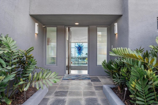 doorway to property featuring a patio