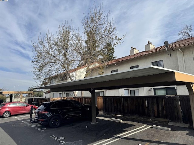 view of car parking featuring a carport