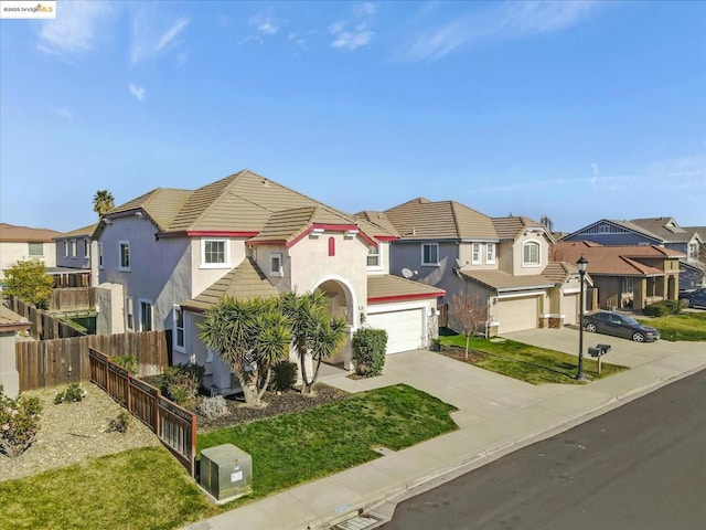 view of front facade with a garage and a front yard