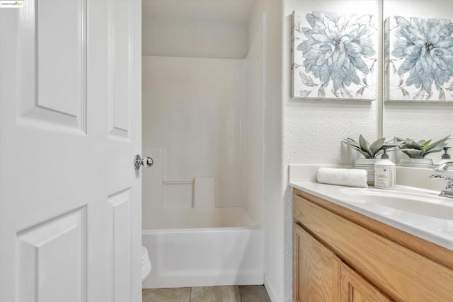 full bathroom with vanity, tile patterned flooring, toilet, and shower / bathing tub combination