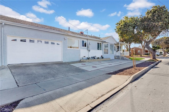 ranch-style house featuring a garage