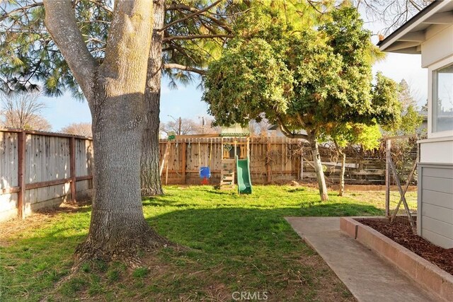 view of yard with a playground