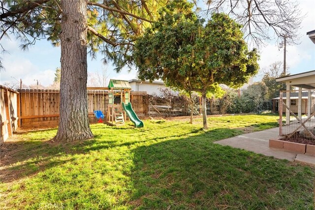 view of yard featuring a playground