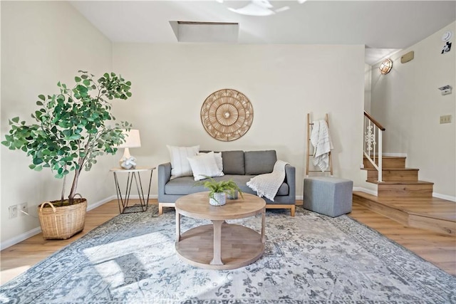 sitting room featuring wood-type flooring