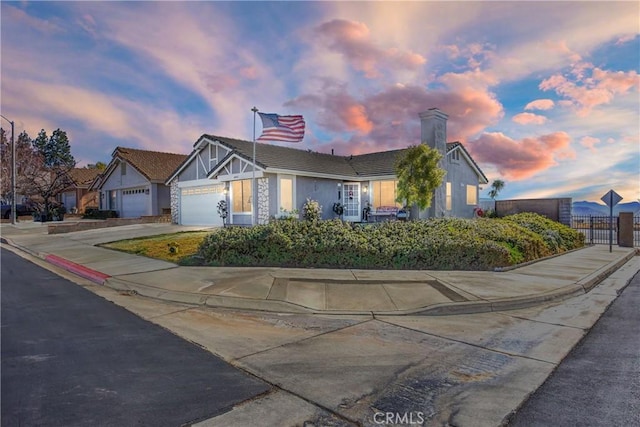 view of front of property with a garage