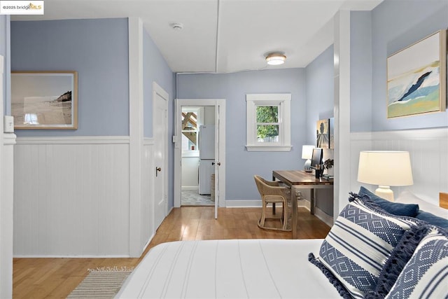 bedroom with light wood-type flooring