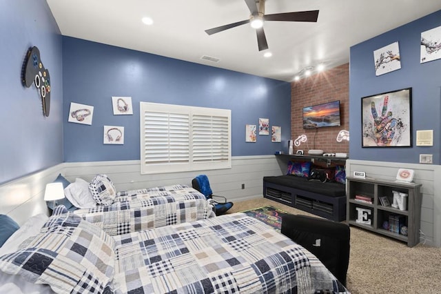 bedroom featuring ceiling fan and carpet flooring