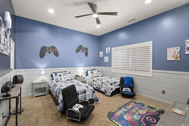 carpeted bedroom featuring ceiling fan