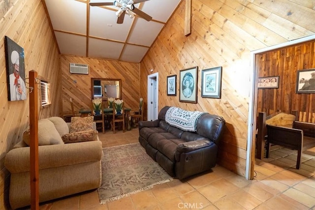 tiled living room with ceiling fan, wooden walls, and a wall mounted AC