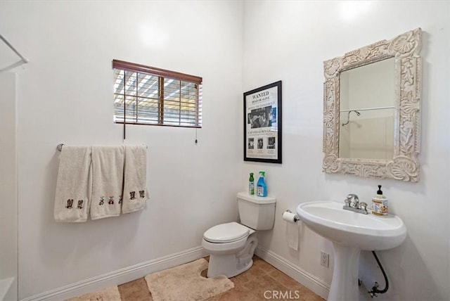 bathroom with toilet and sink