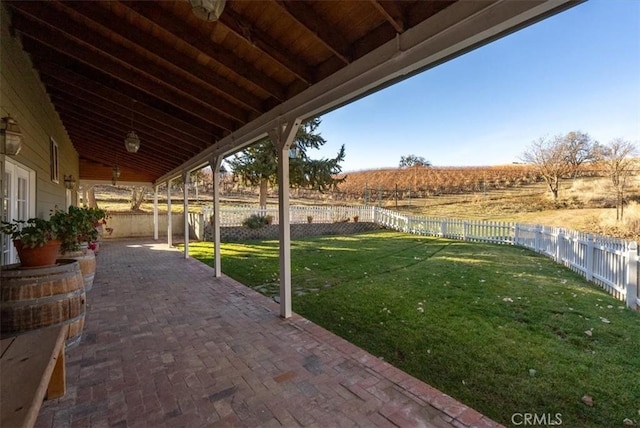 view of patio / terrace with a rural view