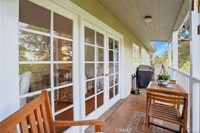 balcony featuring french doors