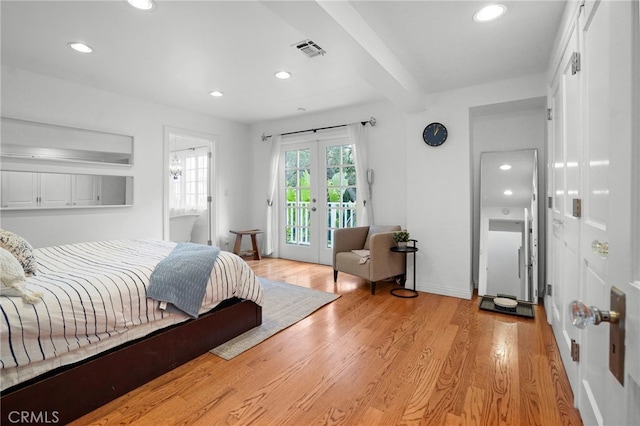 bedroom featuring access to exterior, french doors, beamed ceiling, and light wood-type flooring