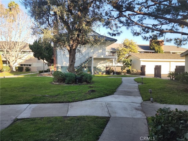 view of front of house with a front lawn