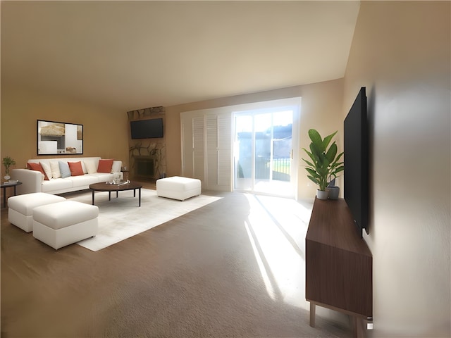 carpeted living room featuring a stone fireplace