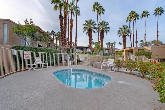 view of swimming pool with a patio area