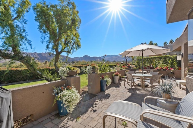 view of patio with a mountain view