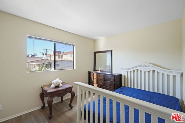 bedroom featuring hardwood / wood-style floors