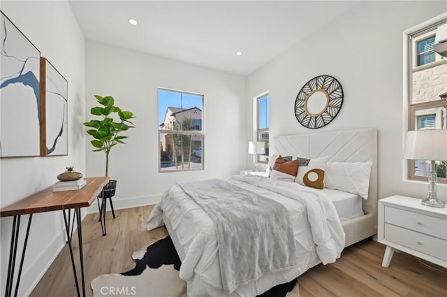 bedroom with light wood-type flooring