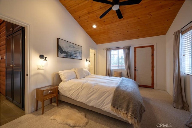 carpeted bedroom with wood ceiling, ceiling fan, and vaulted ceiling