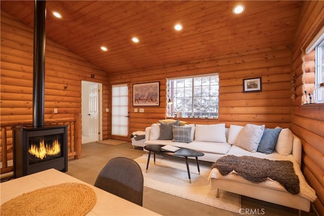 living room with lofted ceiling, wooden ceiling, and log walls