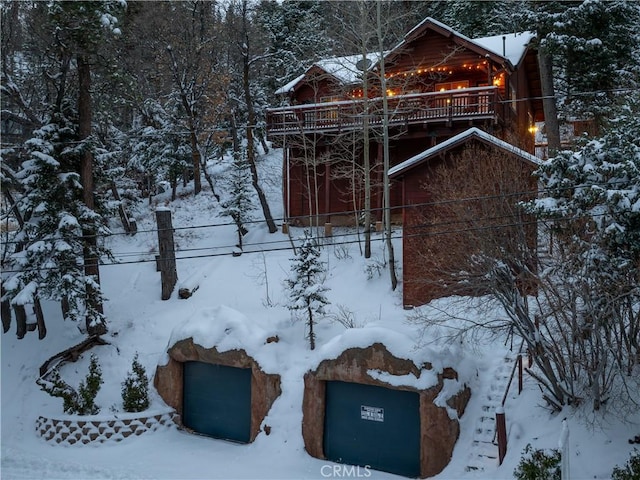 view of snow covered property