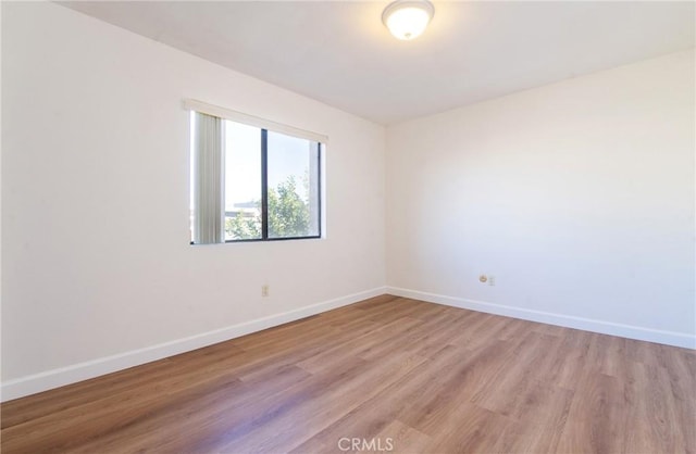 empty room featuring light hardwood / wood-style floors