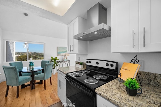 kitchen with white cabinetry, electric stove, light stone countertops, wall chimney exhaust hood, and pendant lighting