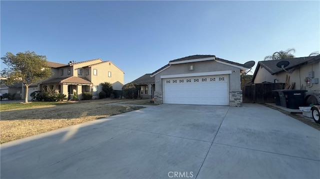 view of front of house featuring a garage and a front yard