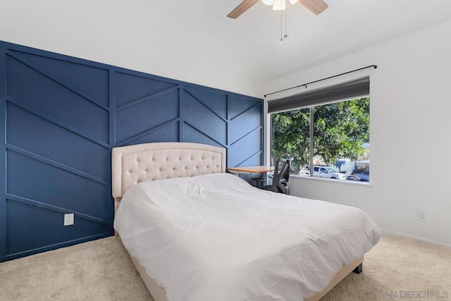 bedroom featuring ceiling fan and light colored carpet