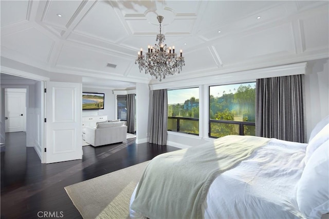 bedroom with coffered ceiling, dark hardwood / wood-style flooring, and a notable chandelier