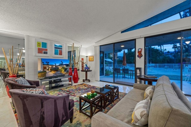 tiled living room with lofted ceiling and a textured ceiling