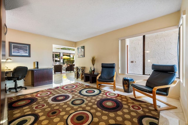 tiled living room with a textured ceiling