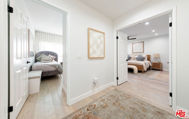 bedroom featuring light wood-type flooring