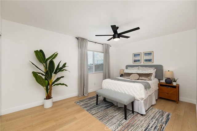 bedroom featuring ceiling fan and light wood-type flooring