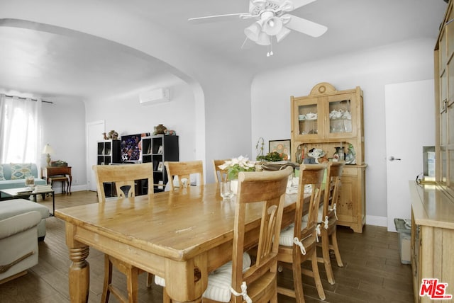 dining area with dark wood-type flooring and ceiling fan