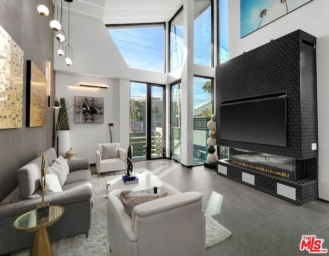 living room featuring a high ceiling