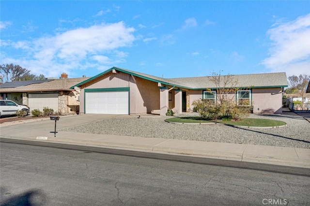 ranch-style home with a garage